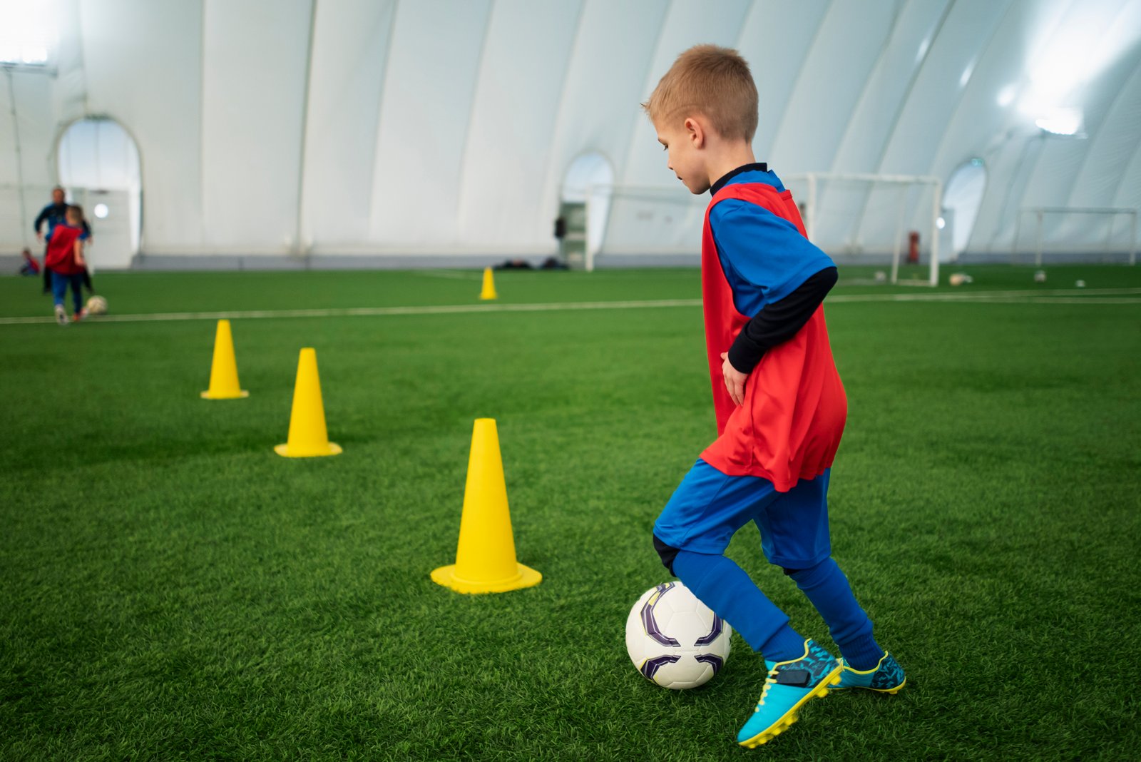 Children enjoying football training